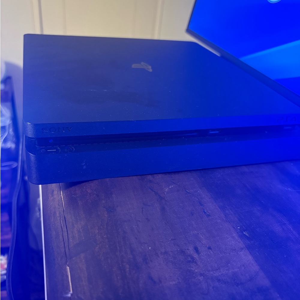 Sony Gaming Console with 2 games and controller